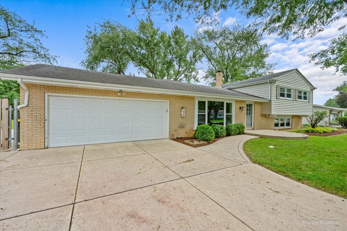 Driveway leading to the attached two-car garage